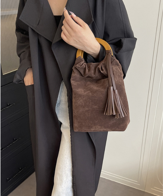 コーデュロイタッセル巾着バッグ