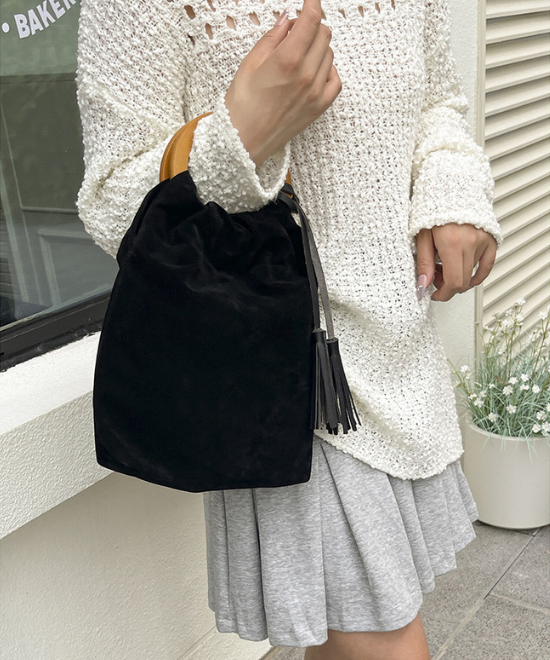 コーデュロイタッセル巾着バッグ