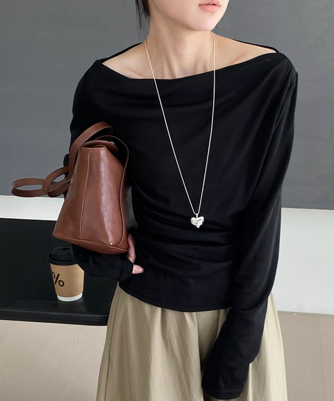 Off -shoulder drape knit